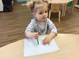 Child at table drawing